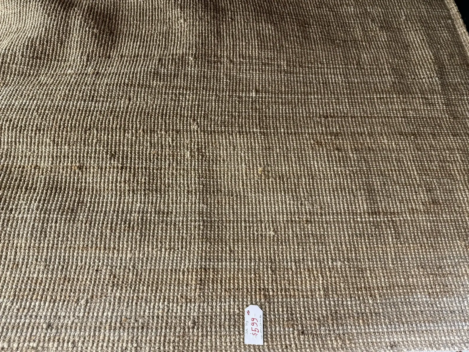 Close view of the woven texture of a natural jute rug