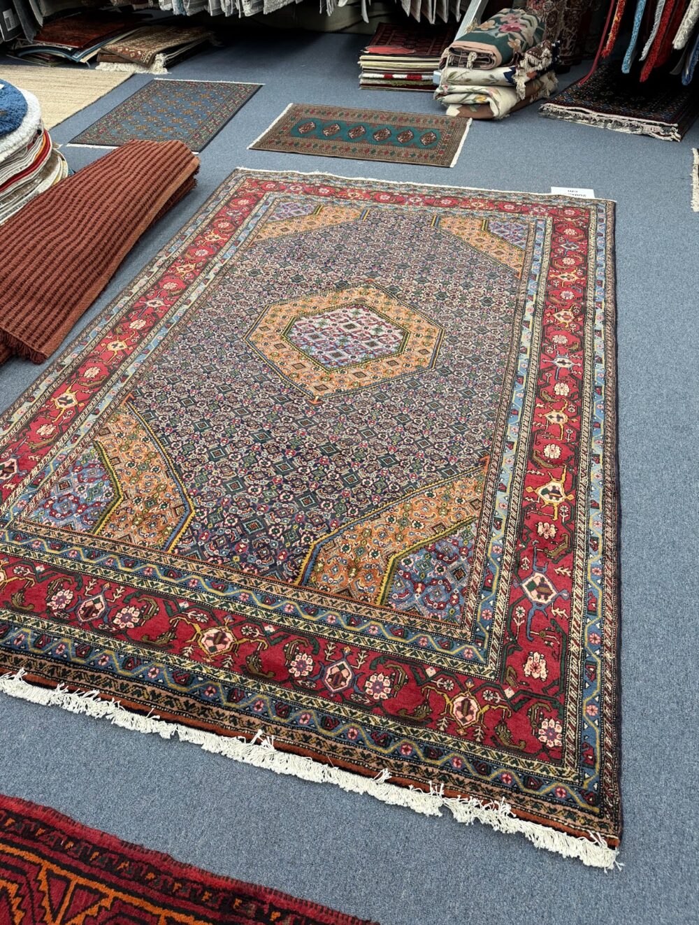 Detailed Persian rug displayed at Royal Persian Carpets