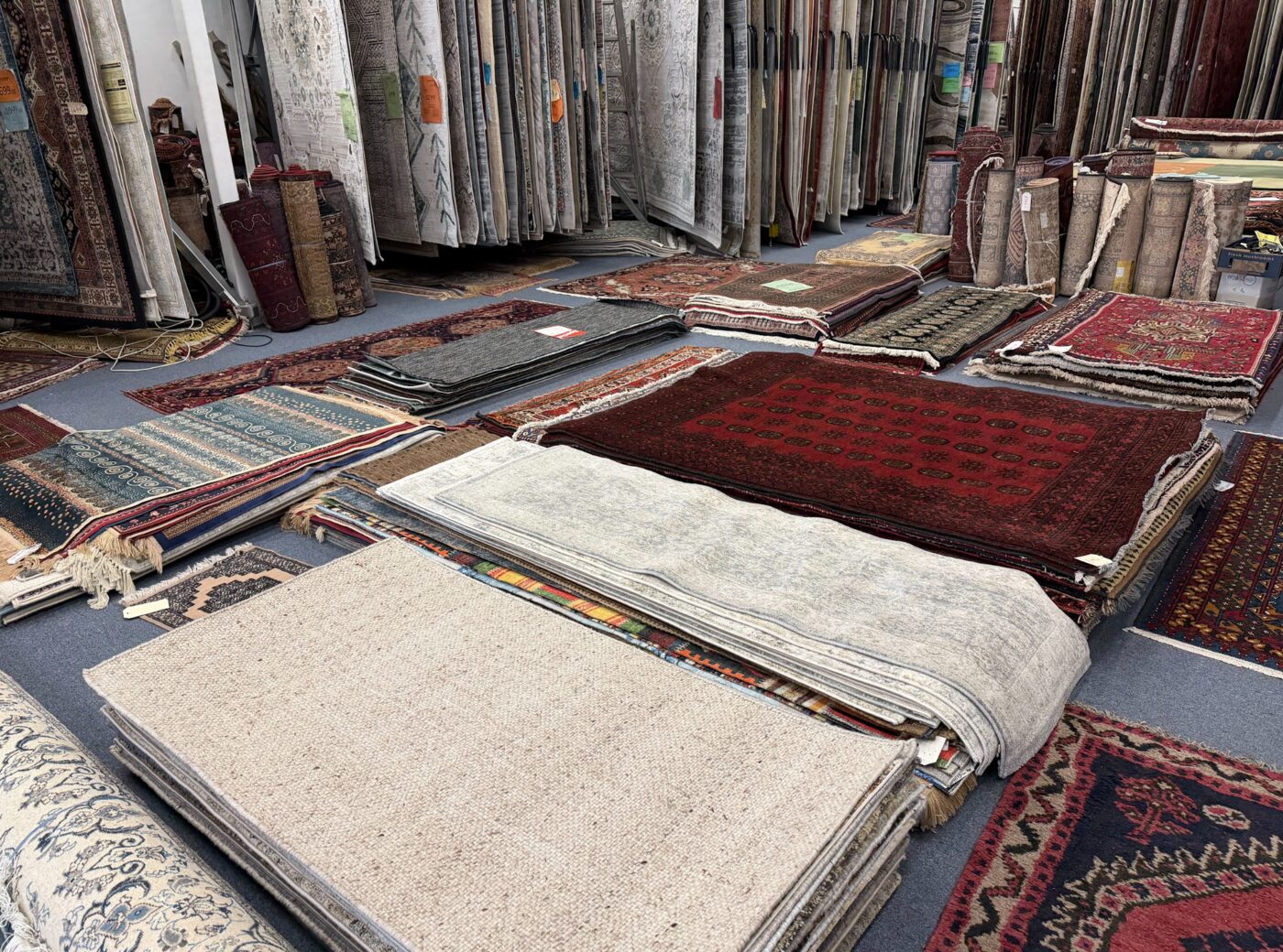 Handmade wool and silk rugs inside the Birtinya showroom