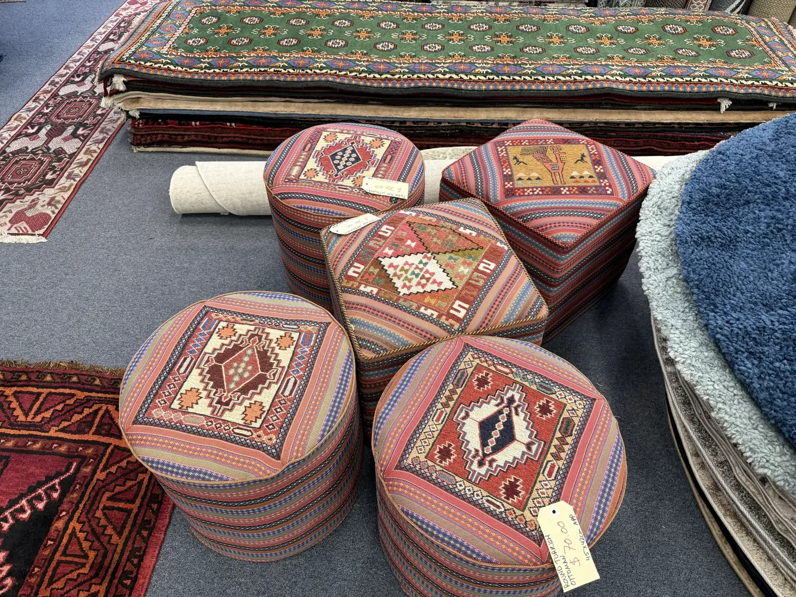 Colourful Turkish ottomans and footstools in the showroom
