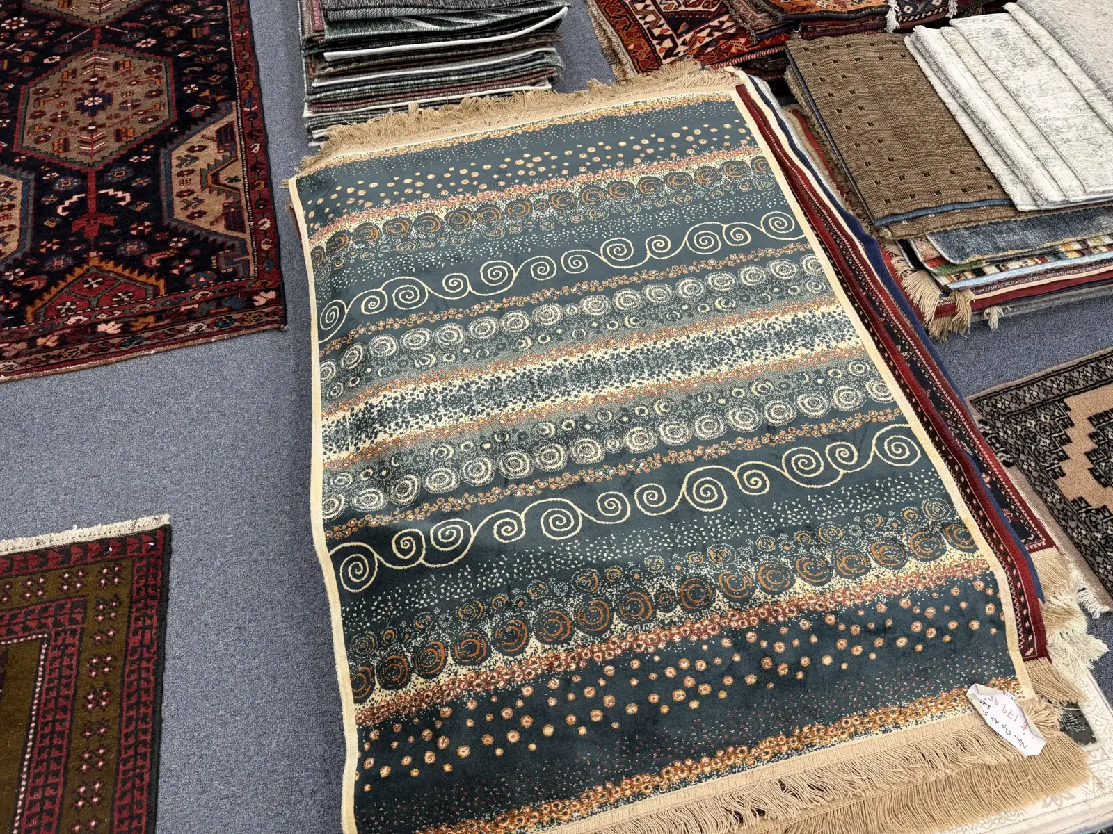 Decorative viscose rug displayed on the showroom floor